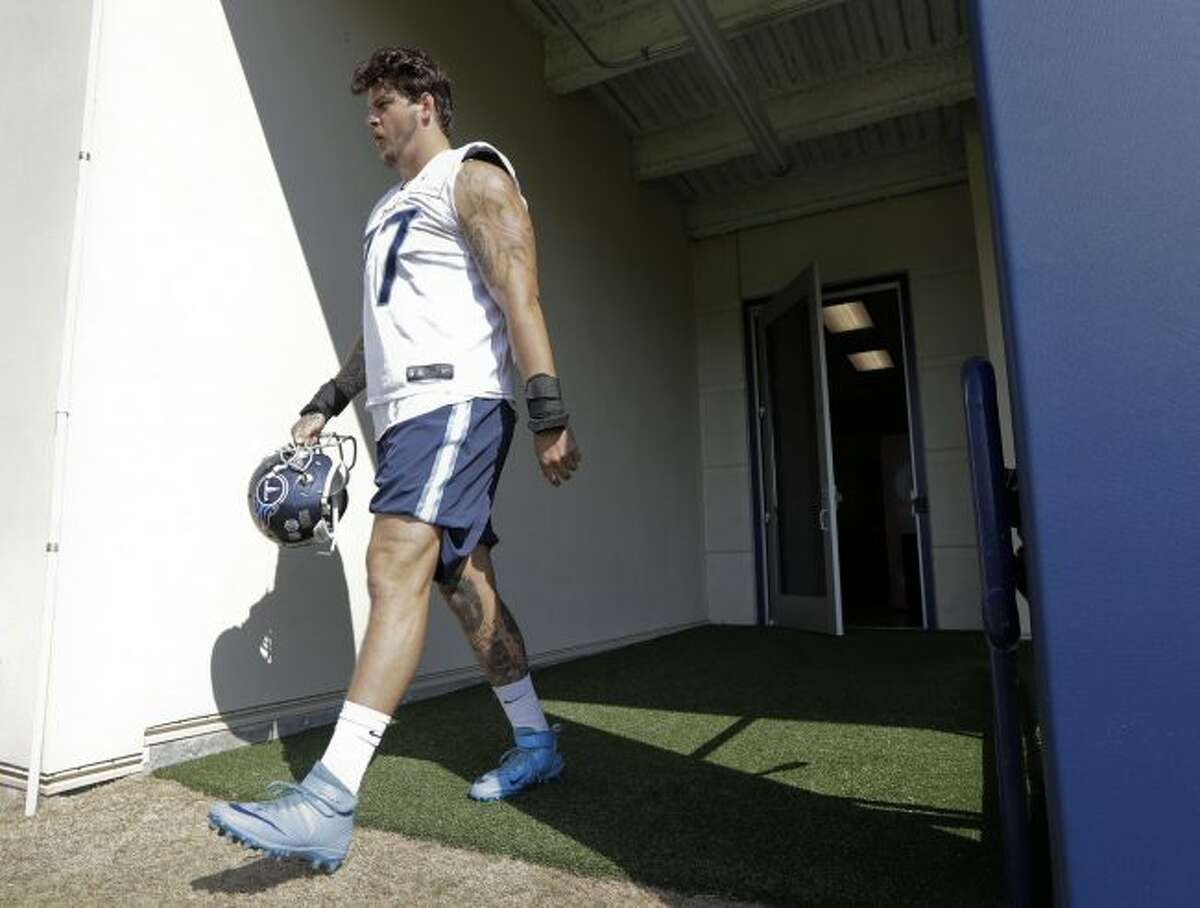 Lewan reports for preseason camp