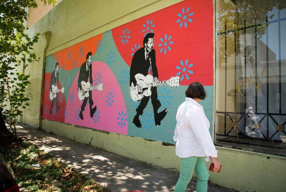 A mural of Chuck Berry fills a wall along Berry Street near the Mid Main Lofts in Houston, Thursday, July 25, 2019. Lane and Bob Schultz have worked to fill much of the common areas along Main Street in that section of midtown with public art form murals to window displays in currently vacant buildings.