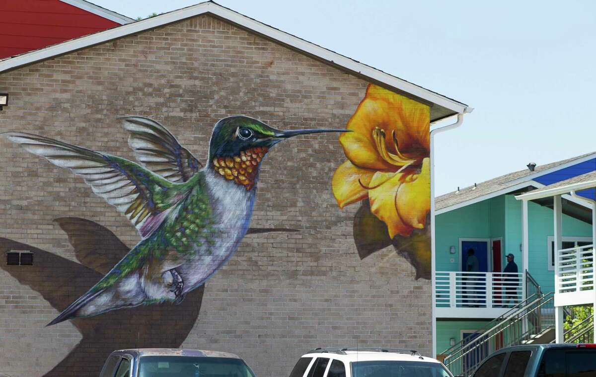 A mural by Houston artist Anat Ronen fills a wall at the Zocalo Apartments in the Spring Branch are of Houston, Thursday, July 25, 2019. The apartments will soon host the city's first commercially-sponsored artist-in-residence program.