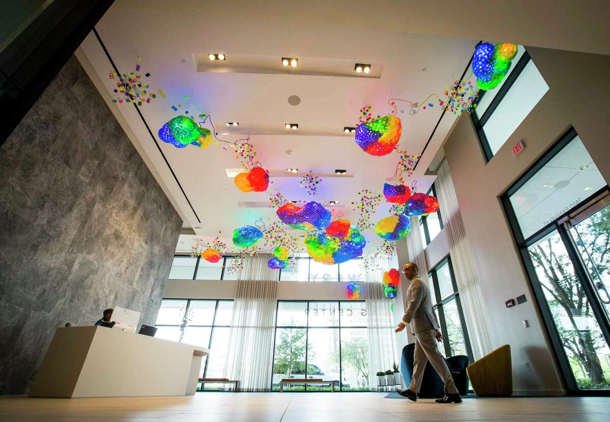 Adela Andea's "The Great Barrier Reef" hangs from the lobby ceiling at the new Drewery Place luxury high-rise in midtown Houston, Tuesday, July 2, 2019.