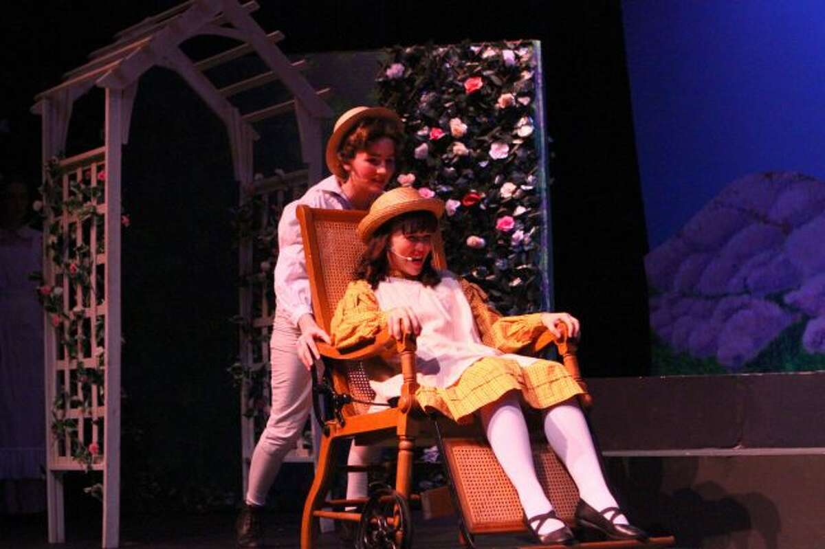 Big Rapids High School students (from left) Adelyn Kirby, playing Colin Craven, and Avery Marsh, as Mary Lennox, act out one of the scenes of the theatrical department's latest production. Current BRHS students, alumni and community members have come together to perform The Secret Garden from Thursday, Nov. 9, to Saturday, Nov. 11. (Pioneer photos/Meghan Gunther-Haas)