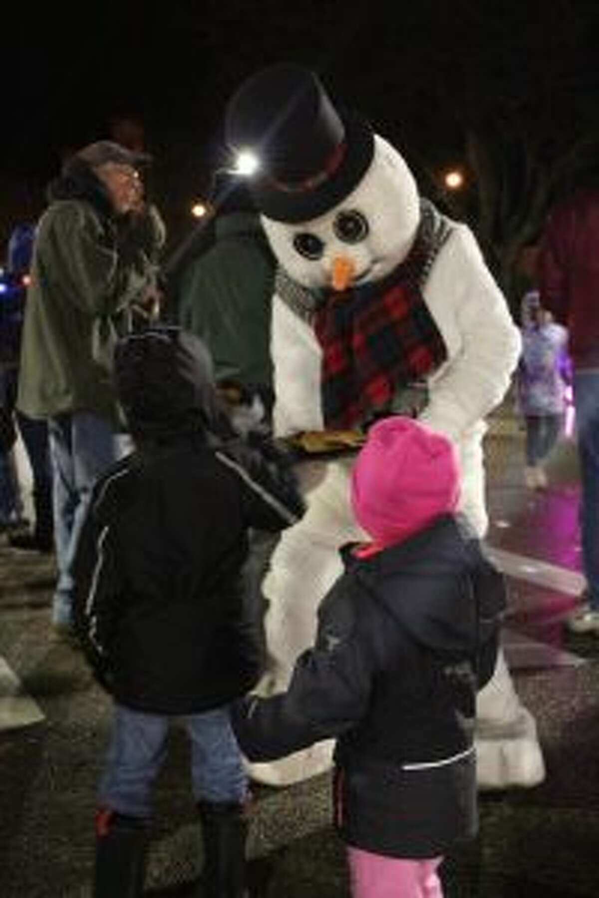 Santa arrives during annual Festival of Lights parade