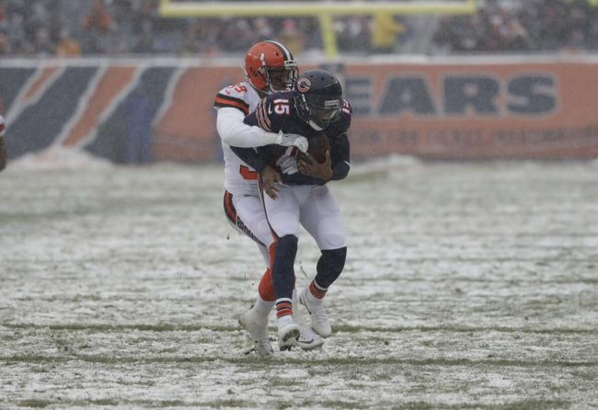 Chicago Bears wide receiver Josh Bellamy (15) is tackled by Cleveland Browns defensive back Justin Currie (39) in the first half of an NFL football game in Chicago, Sunday, Dec. 24, 2017. (AP Photo/Charles Rex Arbogast)