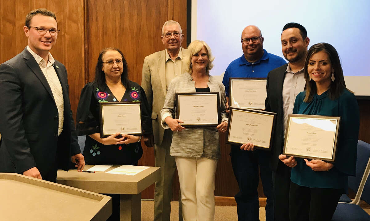From left: City Manager Jeffrey Snyder, City Secretary Belinda Hinojos, (back) Mayor Wendell Dunlap, Main Street Manager/Fair Theater Manager Melinda Brown, Landfill Foreman Brock Lively, Director of Technology Isauro Gutierrez and HR Director Rachel Foster