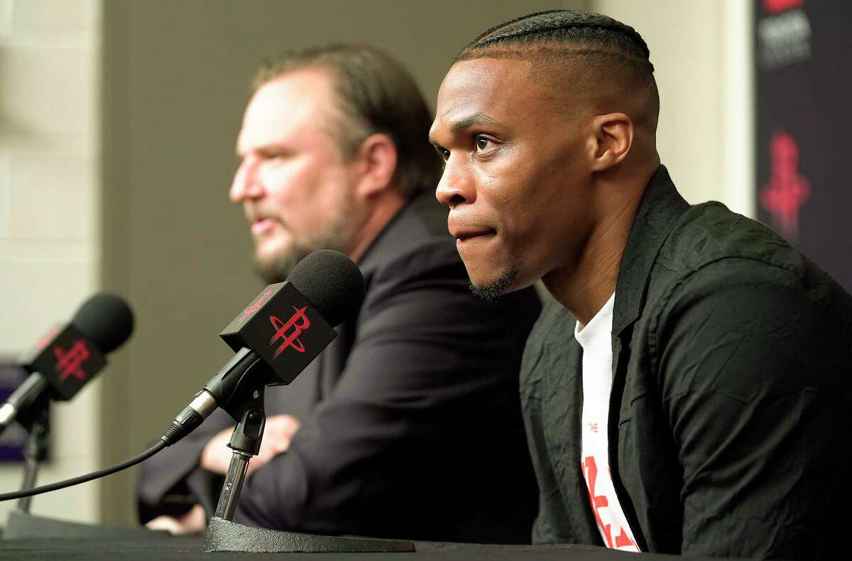 Russell Westbrook talks to the media with Rockets General Manager Daryl Morey during a press conference introducing him at the Toyota Center on Friday, July 26, 2019 in Houston.