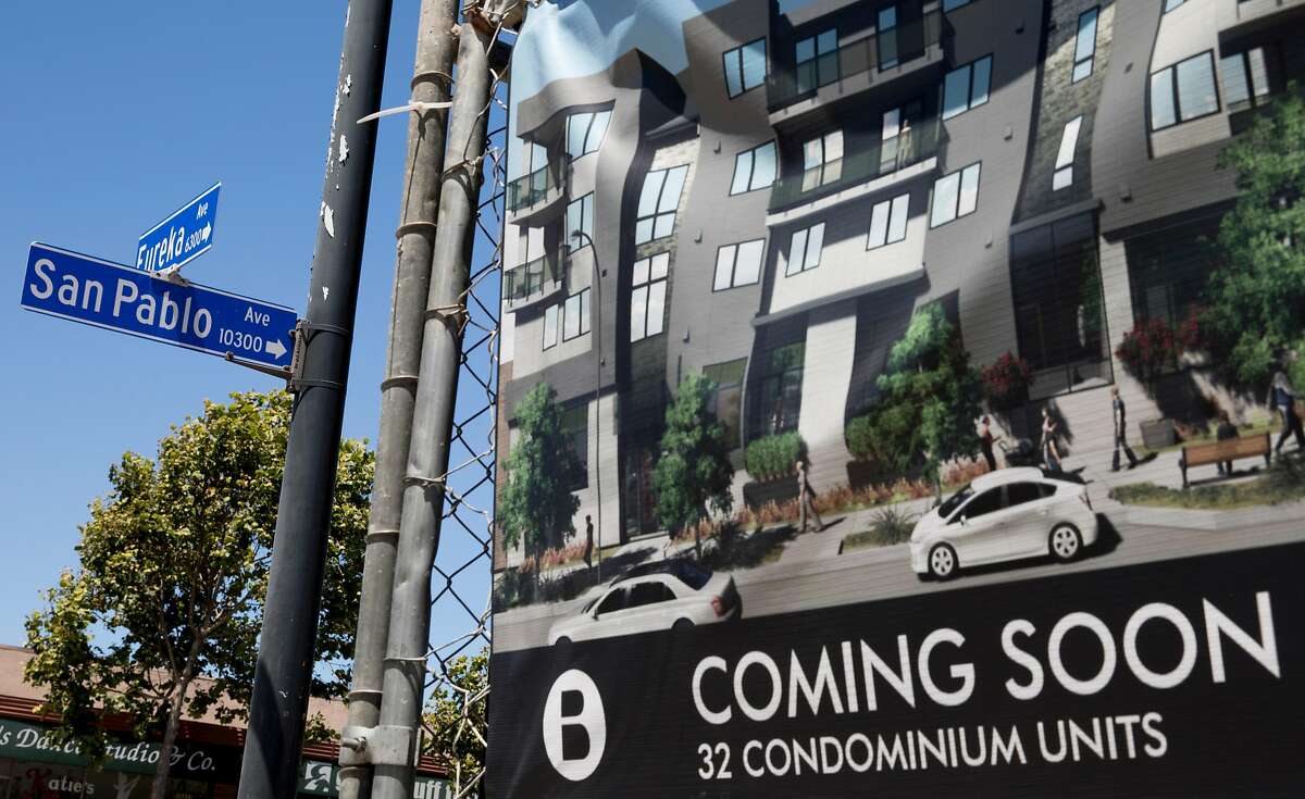 Advertisements for a new housing development in the early stages of construction are seen at the corner of Eureka and San Pablo avenues in El Cerrito, Calif. Tuesday, July 16, 2019.