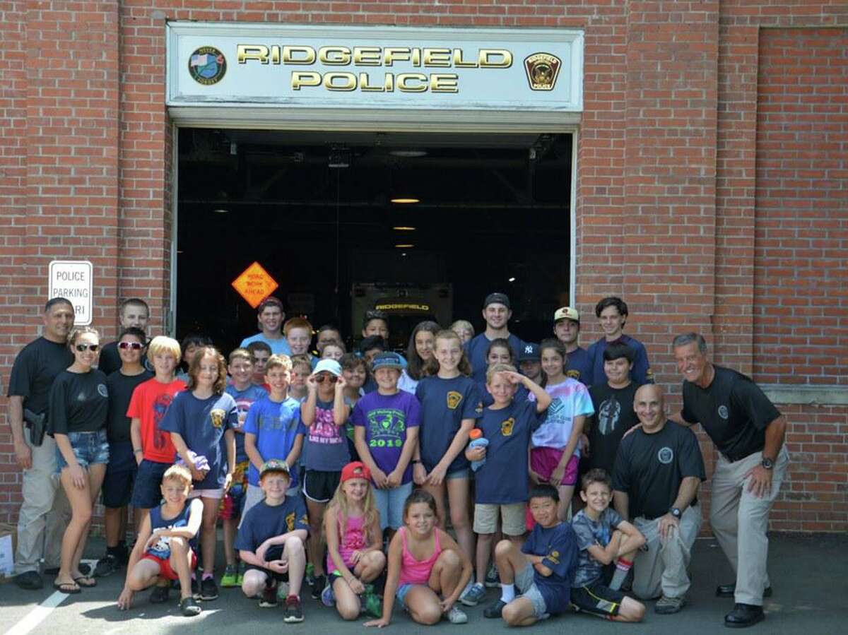 The Ridgefield Police Department hosted its annual Junior Police Academy in the middle of July. During the week-long summer program, campers from the Boys and Girls Club of Ridgefield visit police headquarters to learn what cops do on a daily basis. Exhibits included crime scene investigation, accident reconstruction, laser and radar training, and a K9 demonstration with police dog Loki.