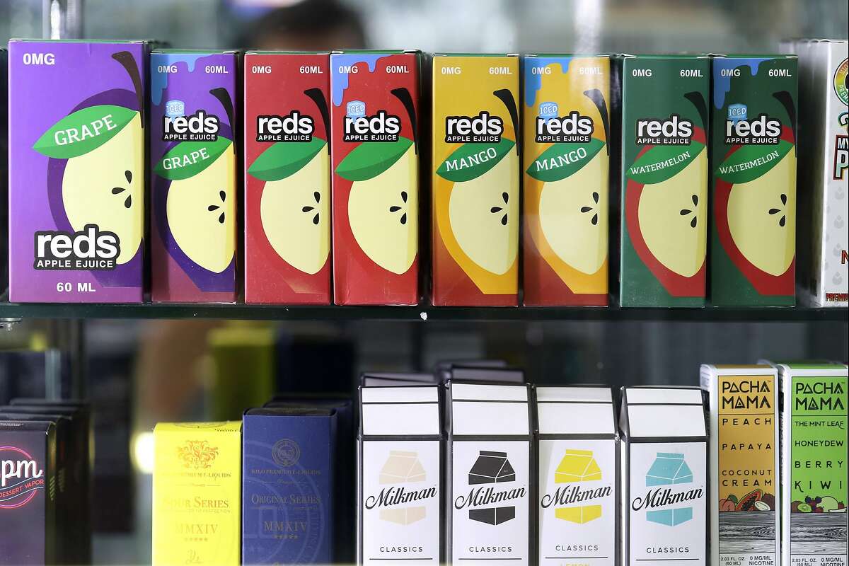 SAN FRANCISCO, CALIFORNIA - JUNE 25: E-juice, used in e-cigarette vaporizers, is displayed at Smoke and Gift Shop on June 25, 2019 in San Francisco, California. The San Francisco Board of Supervisors voted unanimously, 11-0, to be the first city in the Un