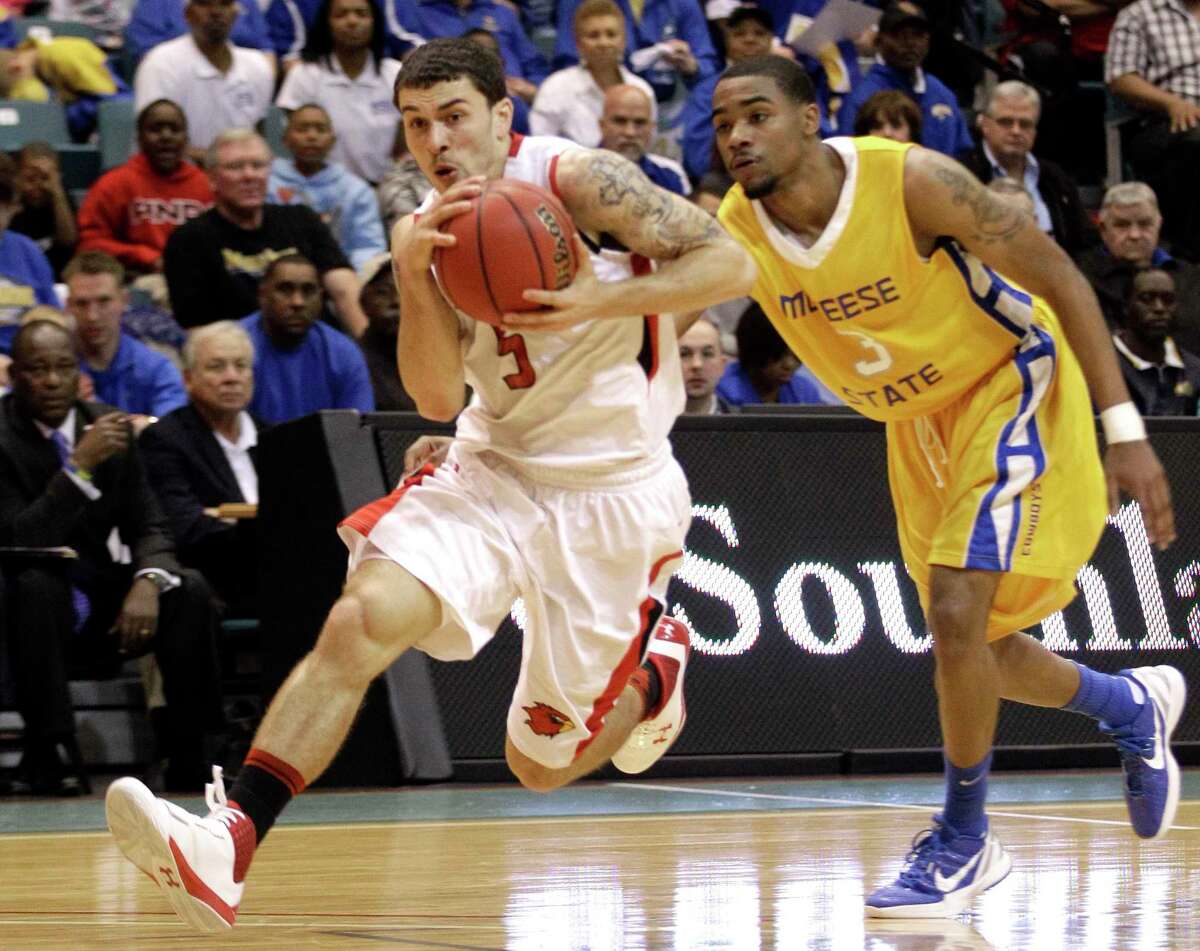 Lamar's Mike James (5) drives past McNeese State's Patrick Richard (3) during the first half of the Southland Conference tournament championship basketball game Saturday, March 10, 2012, in Katy, Texas. (AP Photo/David J. Phillip)