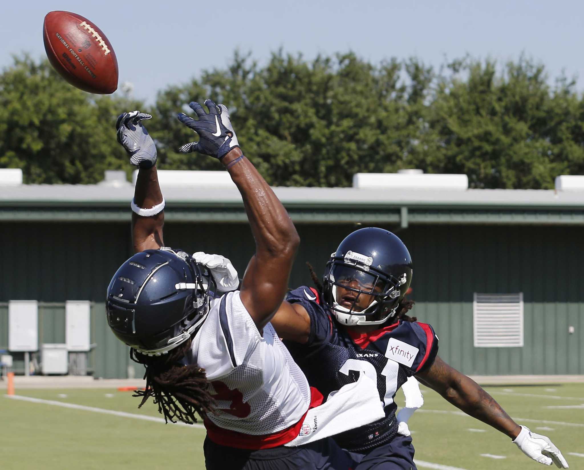 Houston Texans defensive back Xavier Crawford (28) and defensive