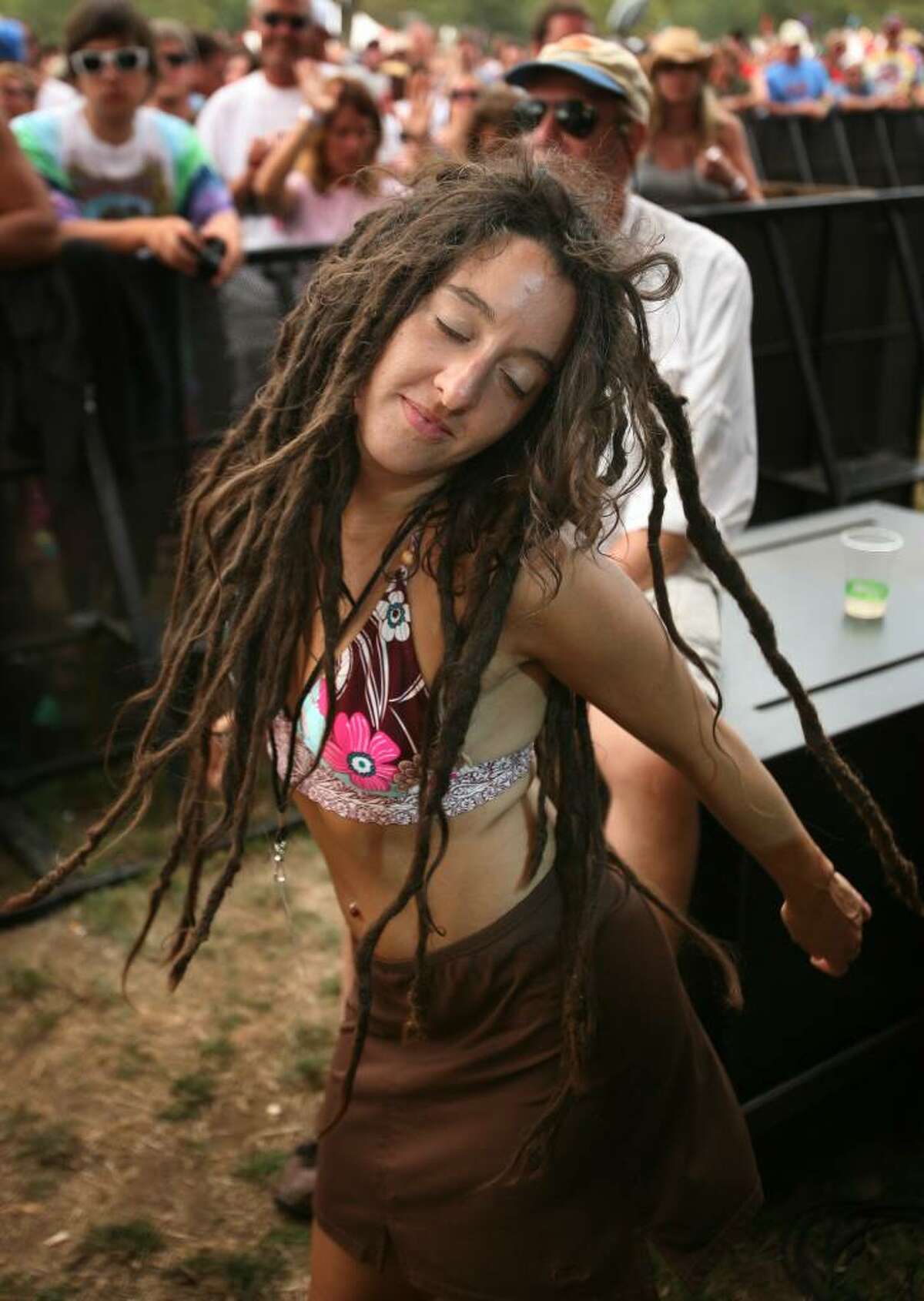 Rebecca Vandevear of San Diego, CA dances during one of the sets at the Gathering of the Vibes music festival at Seaside Park in Bridgeport on Sunday, August 1, 2010.