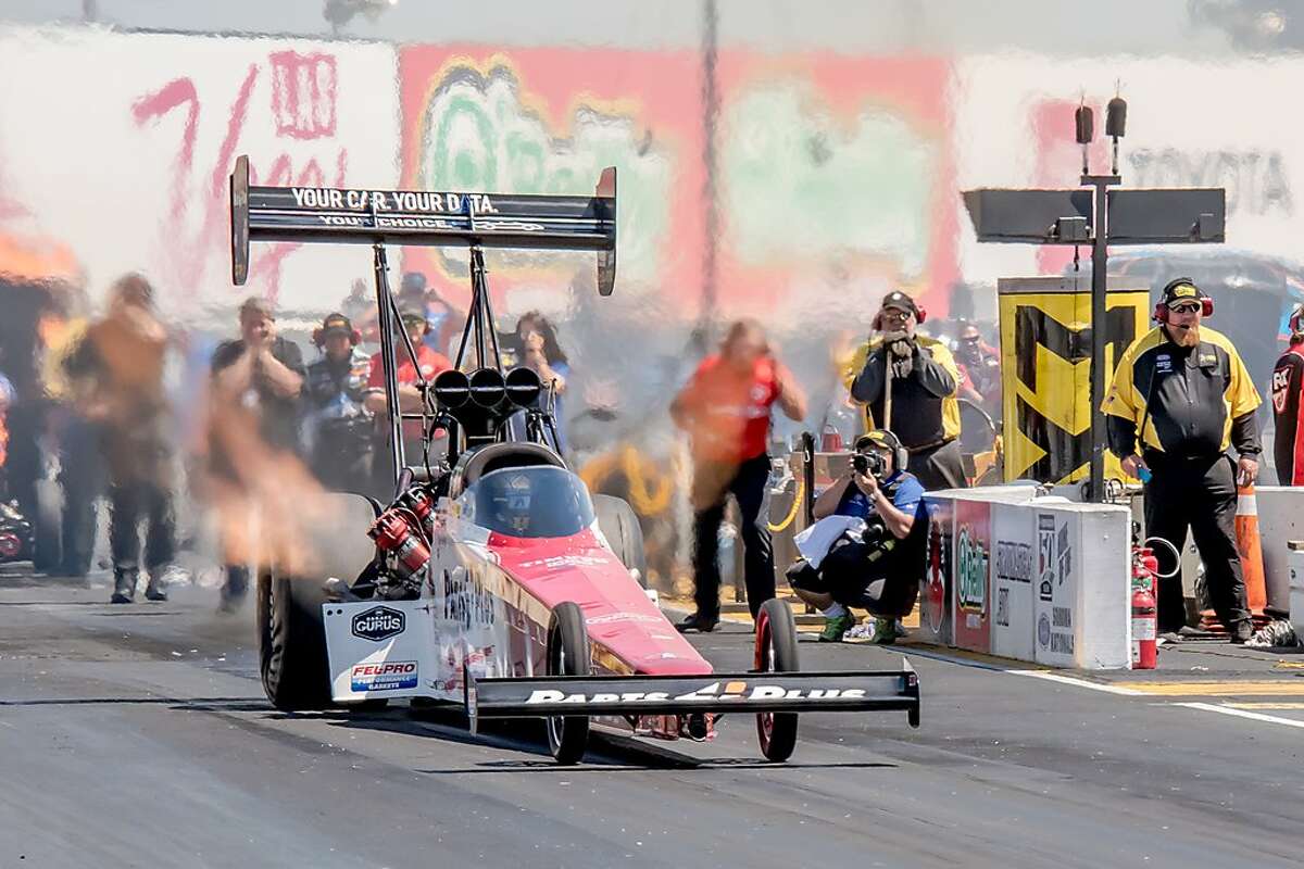 Clay Millican, the top qualifier in Top Fuel, takes off on Saturday at Sonoma Raceway.