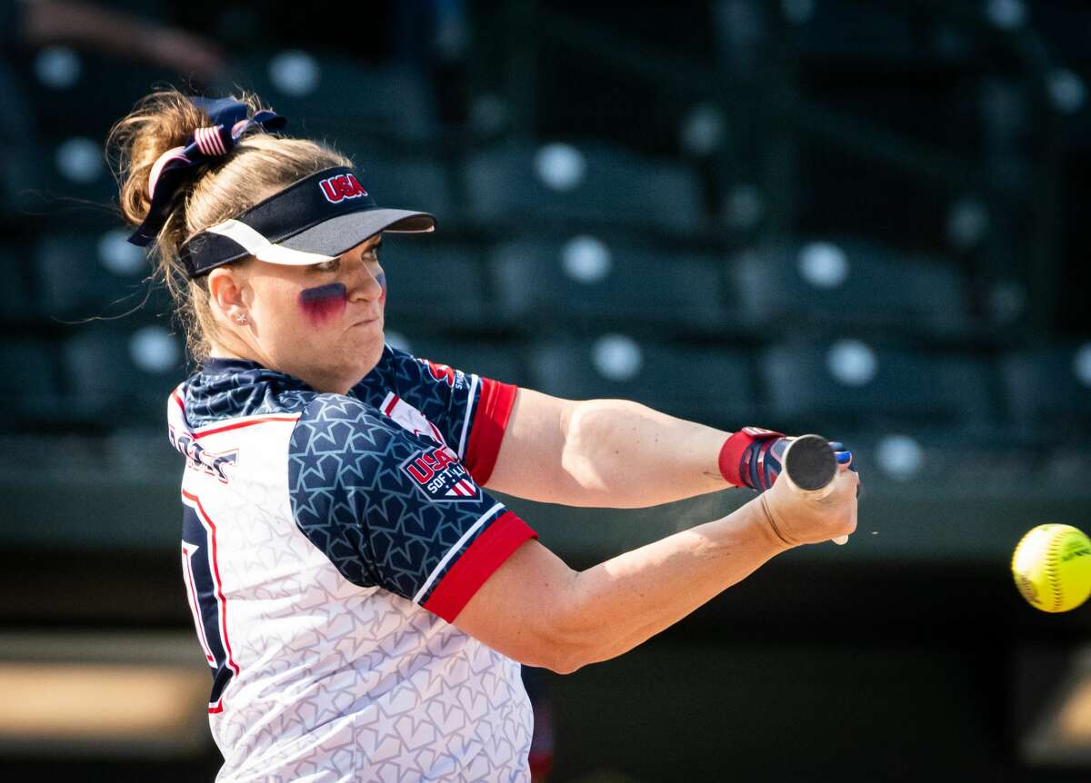 Kami Marrott of team USA swings on a pitch during a game against Canada in the Border Battle XI at Dow Diamond Saturday, July 27, 2019. (Steven Simpkins/for the Daily News)