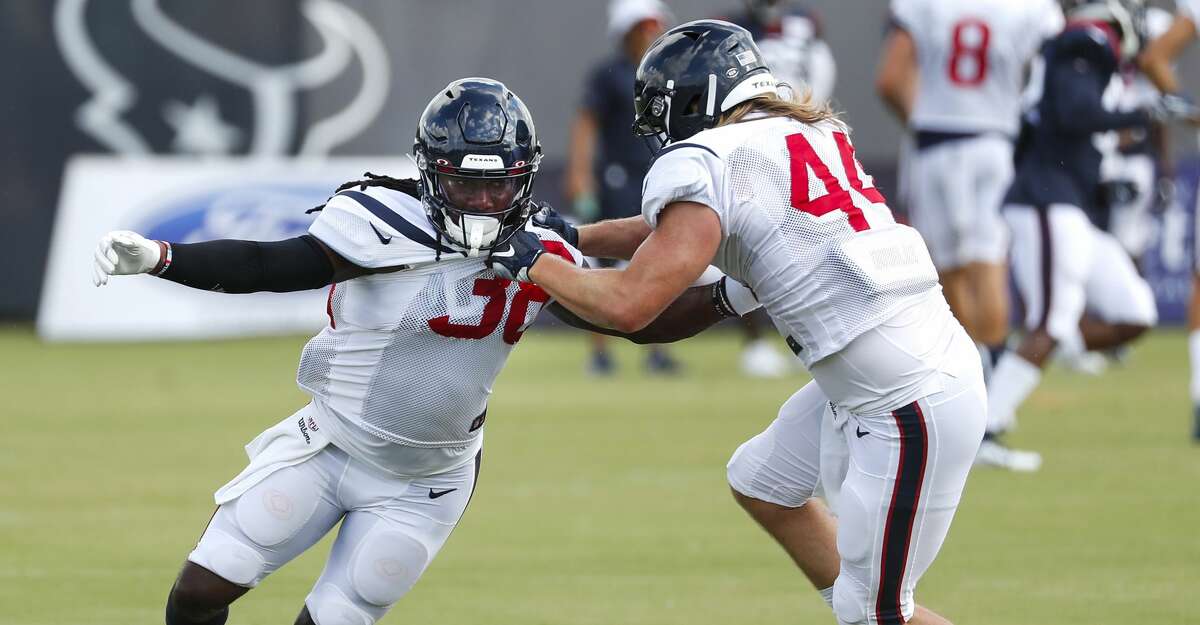 Houston Texans running backs Buddy Howell (38) and Cullen Gillaspia (44) work against each other during training camp at the Methodist Training Center on Saturday, July 27, 2019, in Houston.
