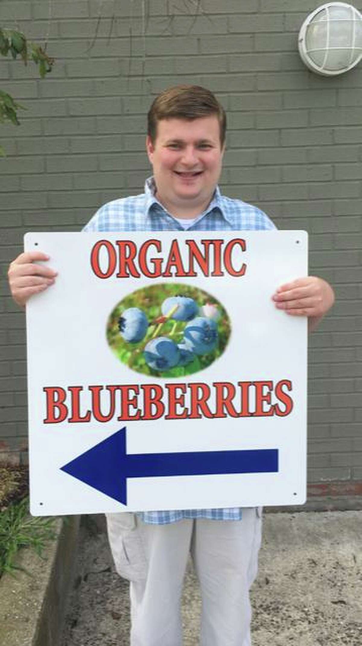 Graham Moore and others from Greenwich-based Abilis are selling organic blueberries around town as part of the Grahamberries program, a unique partnership with an organic blueberry farm in upstate New York.