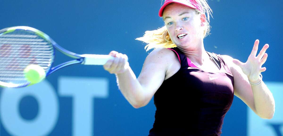 Coco Vandeweghe hits a forehand against Jelena Kostanic Tosic during a qualifying match at the Pilot Pen tennis tournament in New Haven on 8/20/2010. Photo by Arnold Gold AG0382B