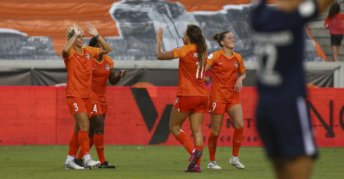 Houston Dash forward Rachel Daly (3) celebrates with teammates after scoring a goal against Sky Blue FC during an NWSL match at BBVA Stadium Sunday, July 28, 2019, in Houston.