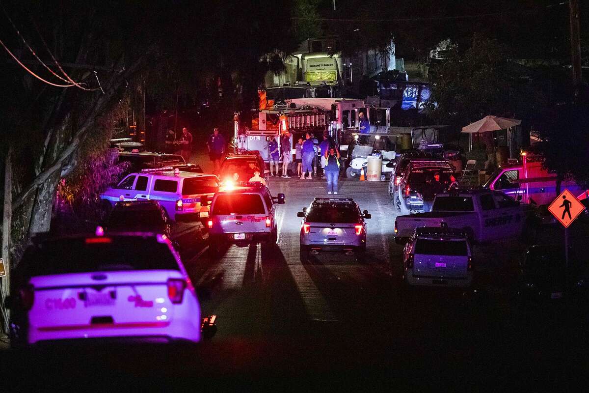 Police vehicles arrive on the scene of the investigation following a deadly shooting at the Gilroy Garlic Festival in Gilroy, 80 miles south of San Francisco, California on July 28, 2019. - Three people were killed and at least 15 others injured in a shooting at a major food festival in California on Sunday, police said. Officers confronted and shot dead the suspect "in less than a minute," said Scot Smithee, police chief of the city of Gilroy, 30 miles (48 kilometers) southeast of San Jose. (Photo by Philip Pacheco / AFP)PHILIP PACHECO/AFP/Getty Images