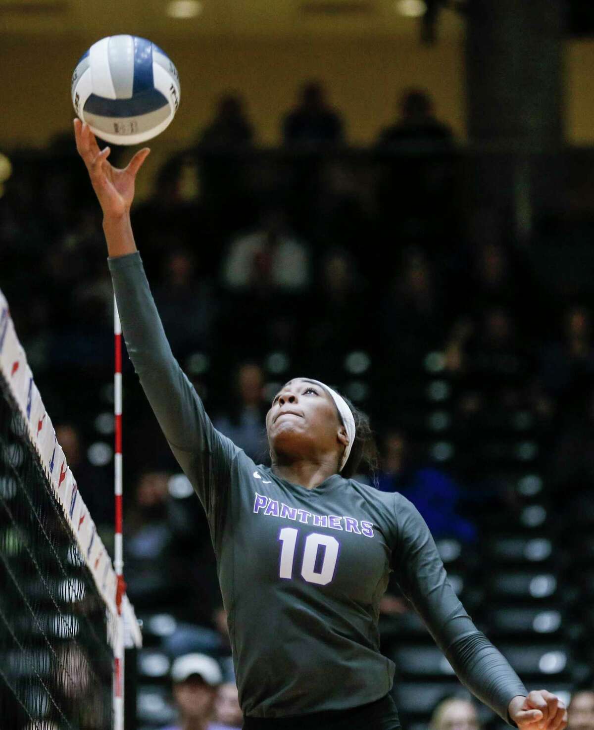 Ridge Point junior Reagan Rutherford hits the ball over the net during a Class 6A State Semifinal volleyball game against Plano West at the Curtis Culwell Center in Garland, Texas, Friday, November 16, 2018. Ridge Point won the match in four sets to advance to the State Finals. (Brandon Wade/Contributor)