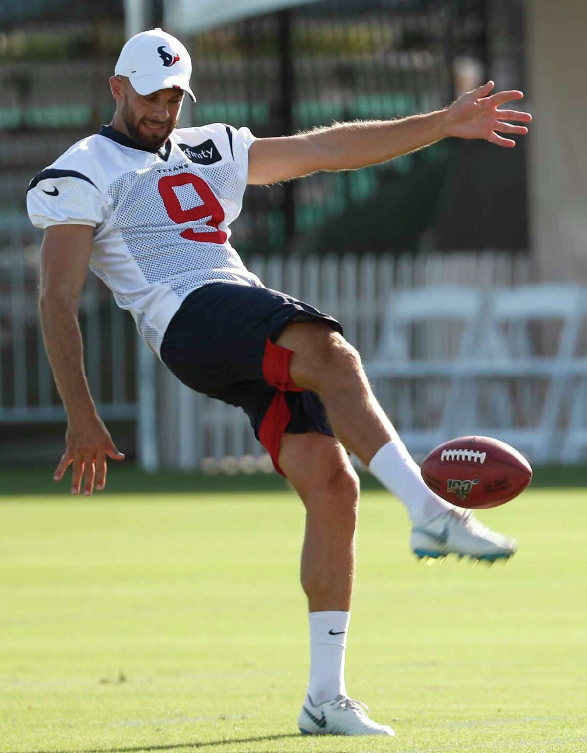 Houston Texans punter Bryan Anger punts the ball during training camp at the Methodist Training Center on Monday, July 29, 2019, in Houston.