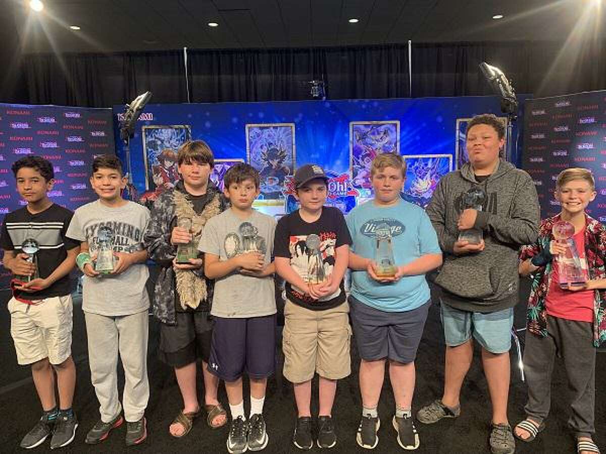 The top eight finalists at the Yu-Gi-Oh World Championship qualifier earlier this summer were, from left to right: Lucas Oswald, Jacob Elson, DaVinci Sukienik, Colin McIntee, Jack Winstanley, Jason James, Giovanni White, and Wael Hamid. Winstanley is from Ridgefield.