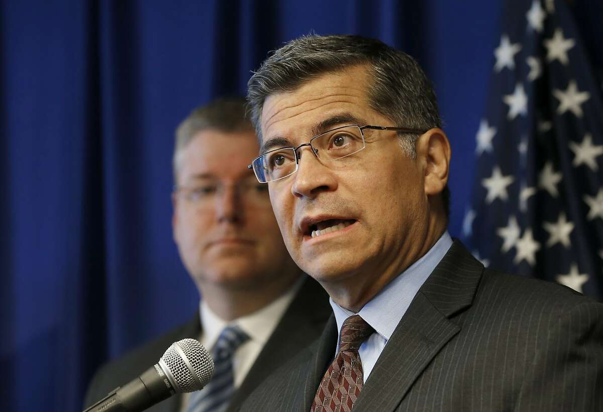 California Attorney General Xavier Becerra discusses the settlement reached with Equifax over a 2017 data breach, during a news conference in Sacramento, Calif., Monday, July 22, 2019. Equifax will pay up to $700 million to settle with the Federal Trade Commission, as well as 48 states, including California, over the data breach that exposed social security numbers and other private information of nearly 150 million people. (AP Photo/Rich Pedroncelli)
