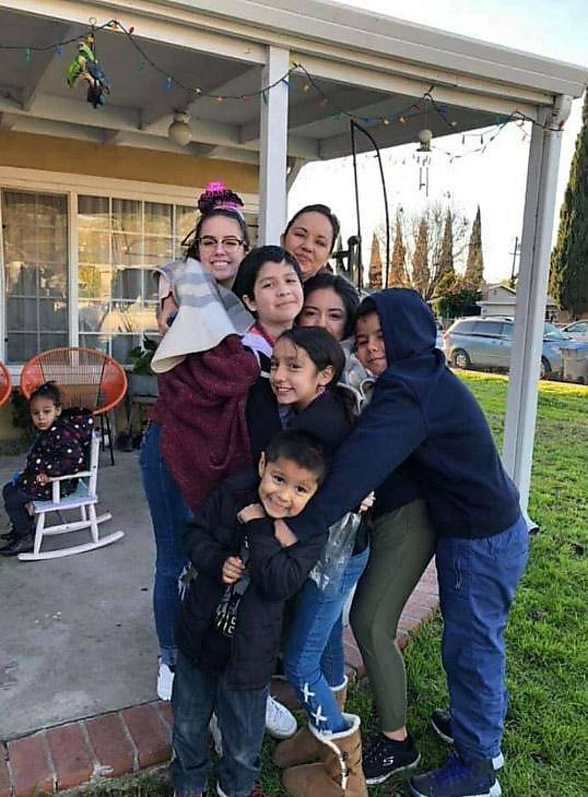 Gilroy Garlic Festival shooting victim Steven Romero, center bottom, in a family photo with his sister and cousins. Photo provided by Noe Romero.