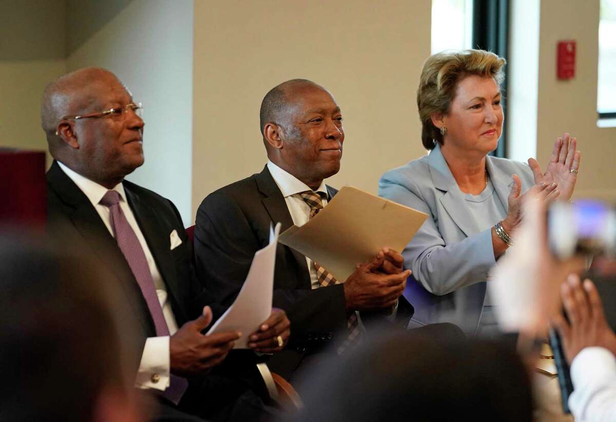 Harvey Clemons Jr., pastor of Pleasant Hill Ministries, left, Houston Mayor Sylvester Turner, and Harris County District Attorney Kim Ogg, are shown during a press conference on Monday, July 29, 2019, about the Center for Urban Transformation’s Juvenile Justice Diversion Program in Fifth Ward in Houston. The CUT announced its first program, in partnership with the Harris County District Attorney’s Office, to help keep youth out of the criminal justice system. The program will work with 12- to 16-year-olds with non-violent offenses and offer mentorship, volunteer work and community-based support services. The CUT is a new organization that represents a collaboration of the Fifth Ward Community Redevelopment Corporation, Pleasant Hill Ministries, Berg & Androphy law firm, Houston Habitat for Humanity, and Legacy Community Health.