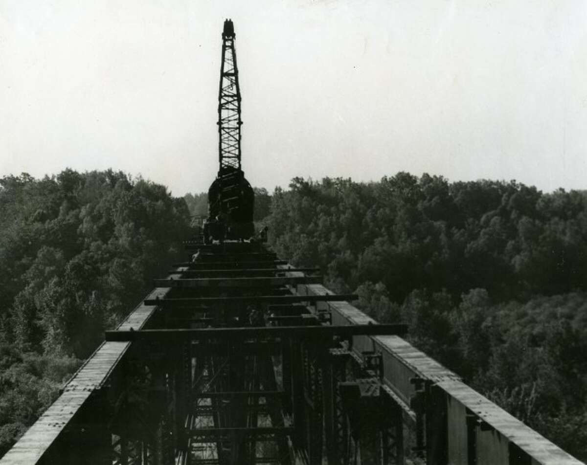Shown is the dismantling of the High Bridge railroad structure in the 1950s.