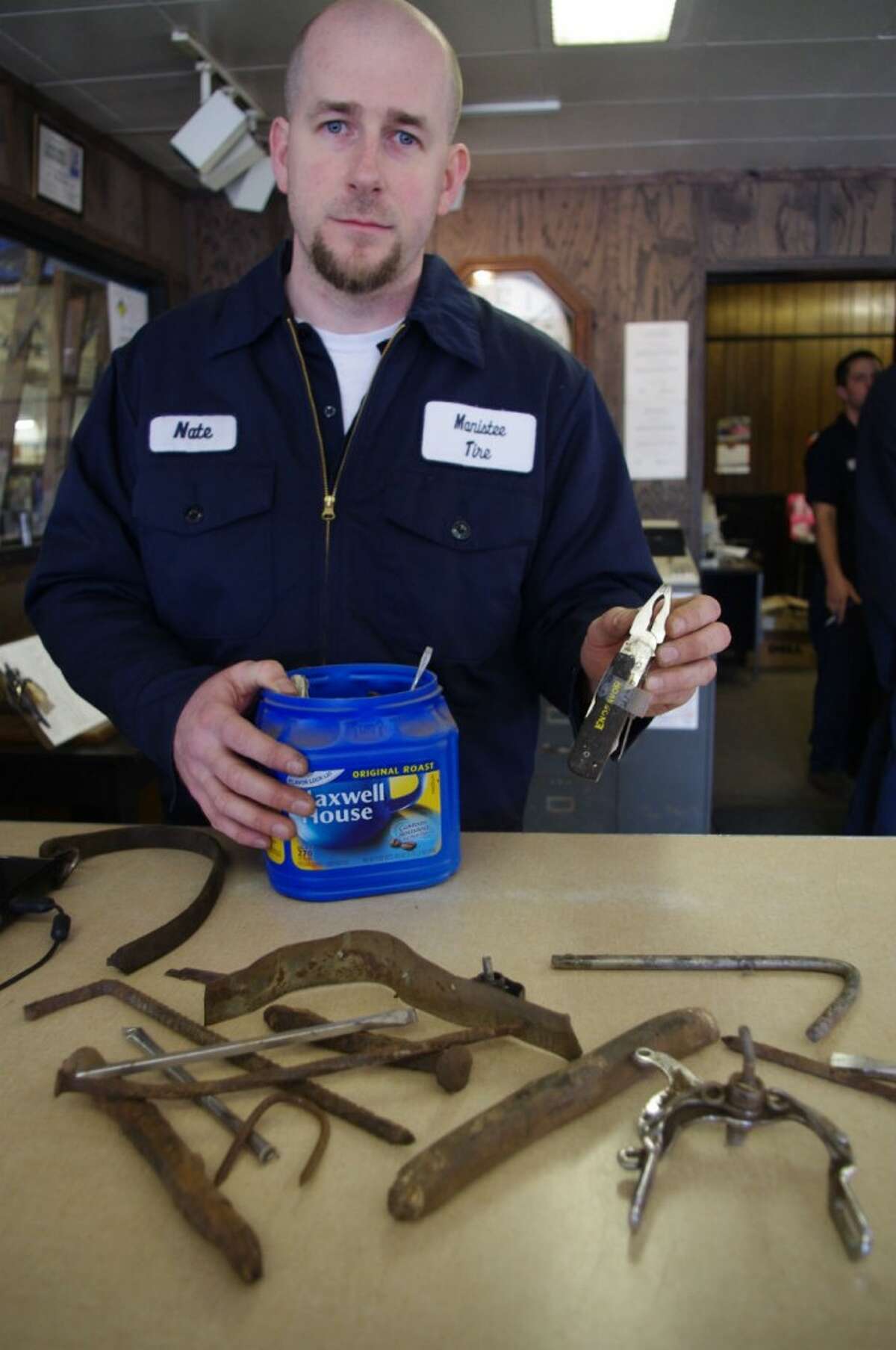 Nate Miller, owner of Manistee Tire, is pictured in this file photo from 2012.