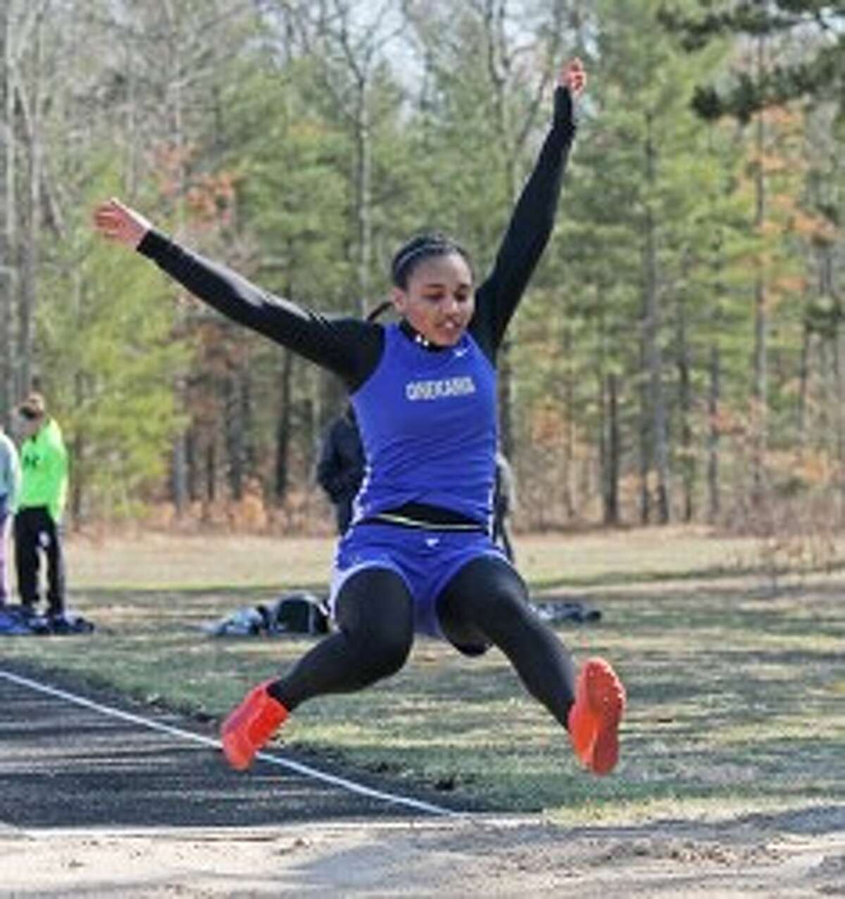 Onekama’s Nisha Collins won the long jump in Wednesday’s West Michigan D League jamboree at Brethren as the Portager boys and girls both won. (Dylan Savela/News Advocate)