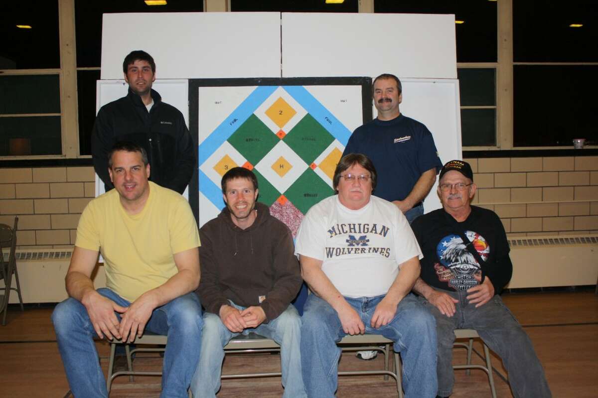 Team No. 1 from Trinity Lutheran Church of Onekama won the 2013 Manistee/Benzie County Churchmen's Dart Ball League tournament, defeating Good Shepherd 5-0 for the title. Members of the championship team are (seated from left to right) are Dan Gustad, Nick Jados, Doug Aultman, Dave Stamp (back row) Tyler Aultman and Greg Welch. (Courtesy Photo)