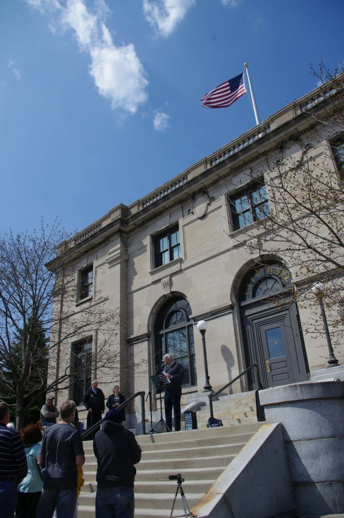 Keith Rupert served as the master of ceremonies for the observance of the National Day of Prayer at noon on Thursday on the steps of Manistee City Hall. (Dave Yarnell/News Advocate)