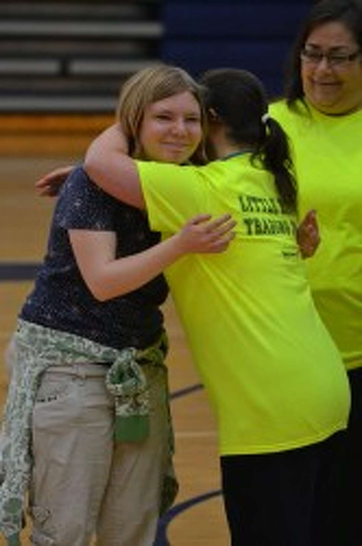 Teachers brave the dunk tank on Disability Awareness Day to raise money for  senior heading for the Special Olympics World Games – AAPS District News