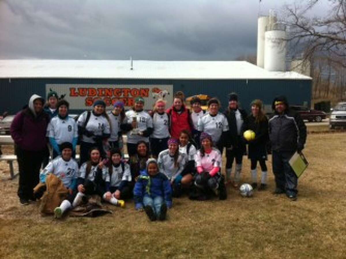 The Manistee soccer team poses with its second-place trophy after finishing 2-0-1 in the Ludington Invitational on Saturday. (Courtesy Photo)