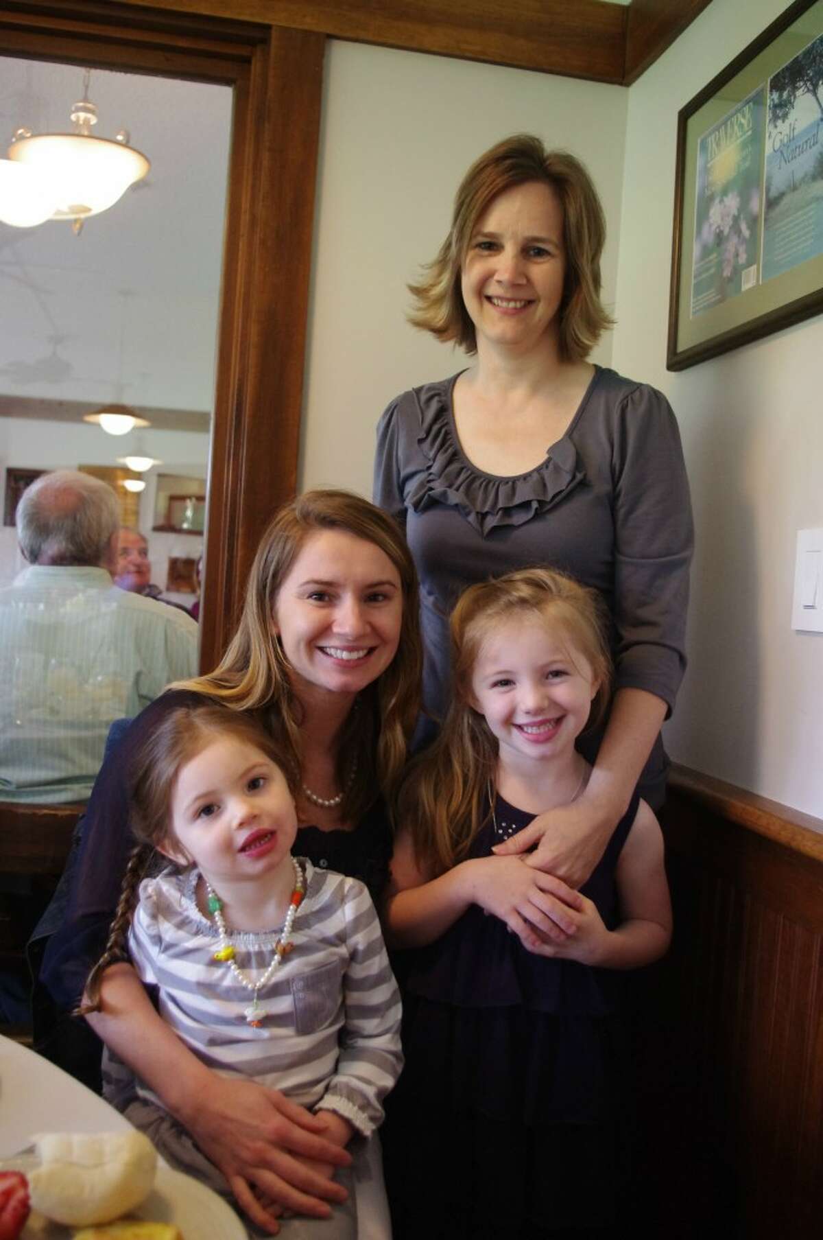 Rachel Maier (seated) of Manistee celebrated Mother’s Day with her children Zoe and Ellie (seated) and also her mother, Wendy Maier (standing) of Brethren. (Dave Yarnell/News Advocate)