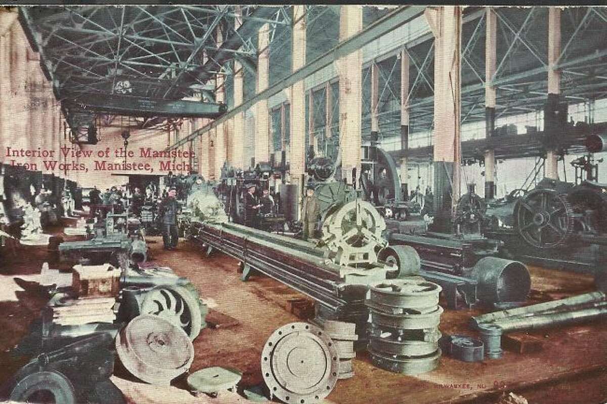 The interior of the Manistee Iron Works building is shown in this photograph from the early 1900s.