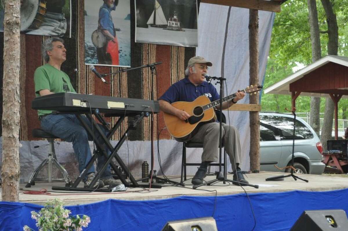 Musicians Talantis and Jans performed on Saturday afternoon during the 37th annual Spirit of the Woods Folk Festival.