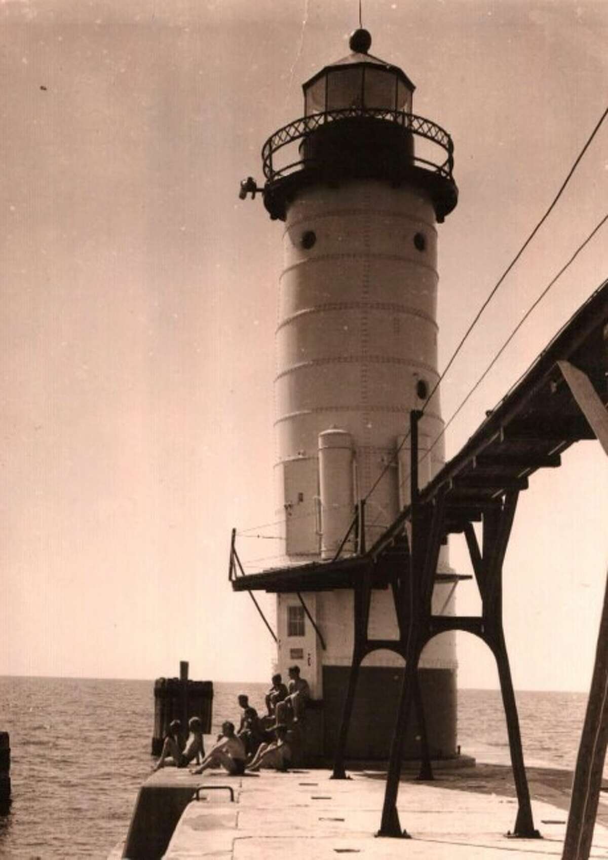 The Manistee North Pierhead Lighthouse circa 1940. Work on restoring the lighthouse is currently underway.