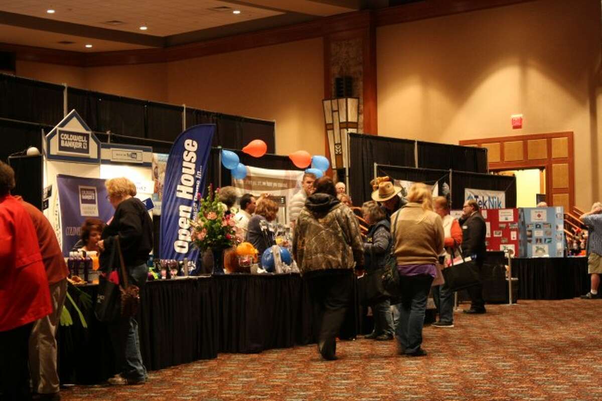 Photo by Sean Bradley / News AdvocatePatrons walk the floors and check out booths of businesses at the seventh annual Manistee Area Chamber of Commerce Business Expo, held last year at the Little River Casino Resort in Manistee.