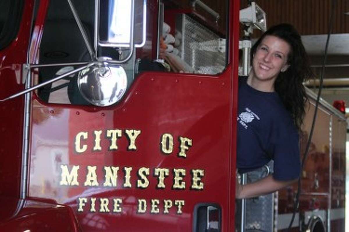 (Abigale Racine/News Advocate) Kayla Linke of Manistee found her life's calling during her volunteer experience with the fire department, and she loves assisting those in need in her community.