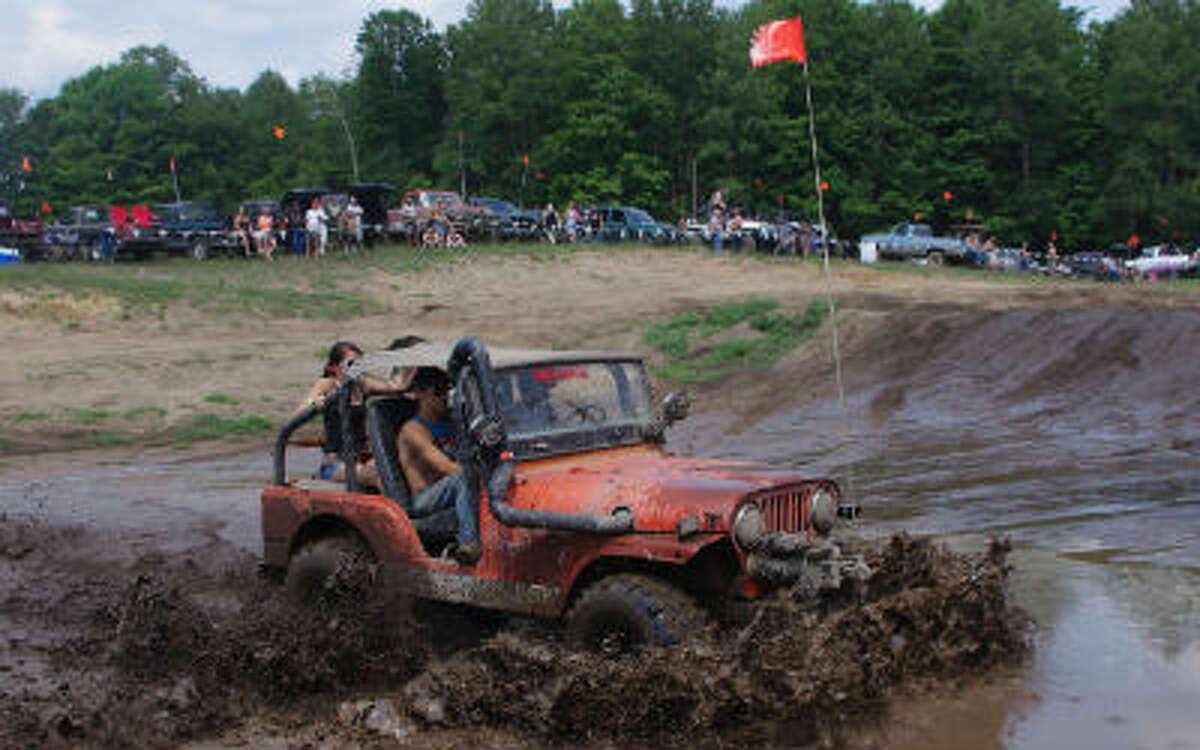 There’s nothing like a Jeep -- and a nice big mud puddle. (Dave Yarnell/News Advocate)