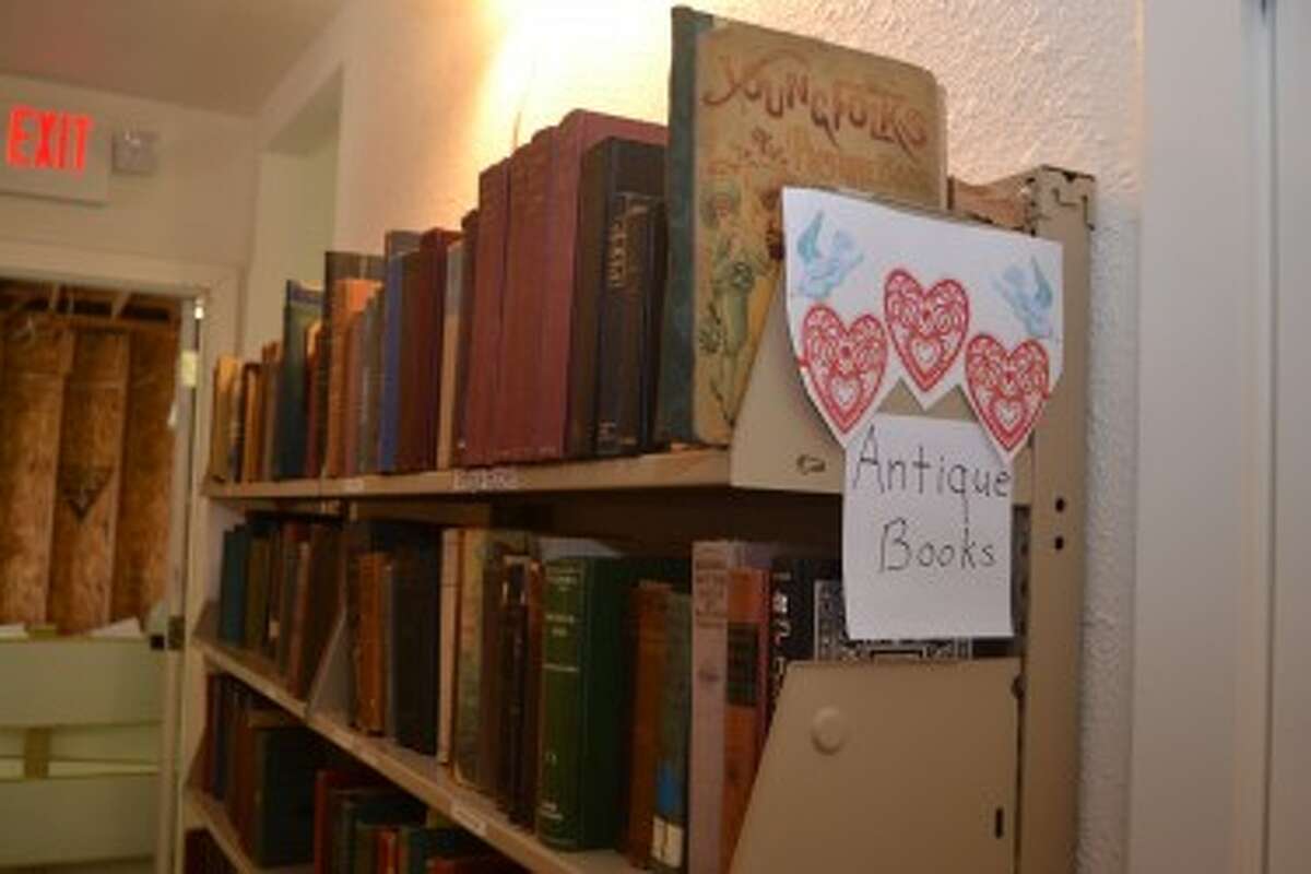 The Book House, a building operated by the Friends of the Manistee County Library, contains shelves full of many types of books, including antique volumes. (Meg LeDuc/News Advocate)