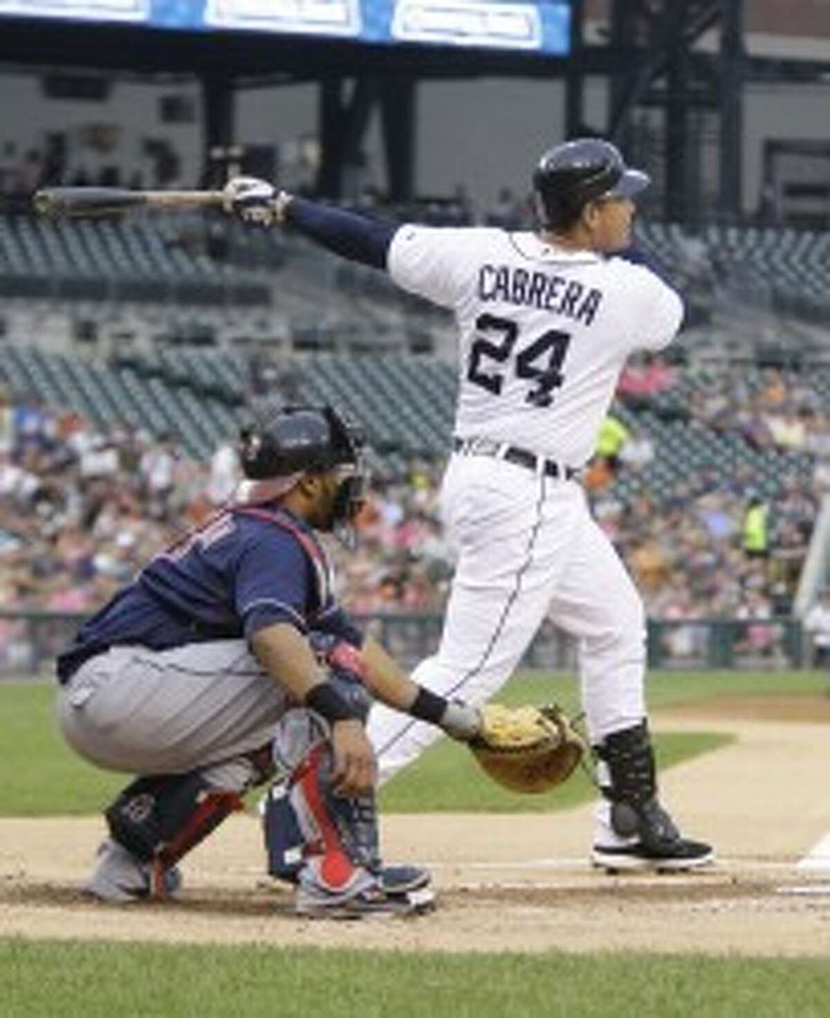Tigers third baseman Miguel Cabrera hits a two-run homer in the first inning against the Cleveland Indians in Detroit on Wednesday. (Julian H. Gonzalez/Detroit Free Press/MCT)