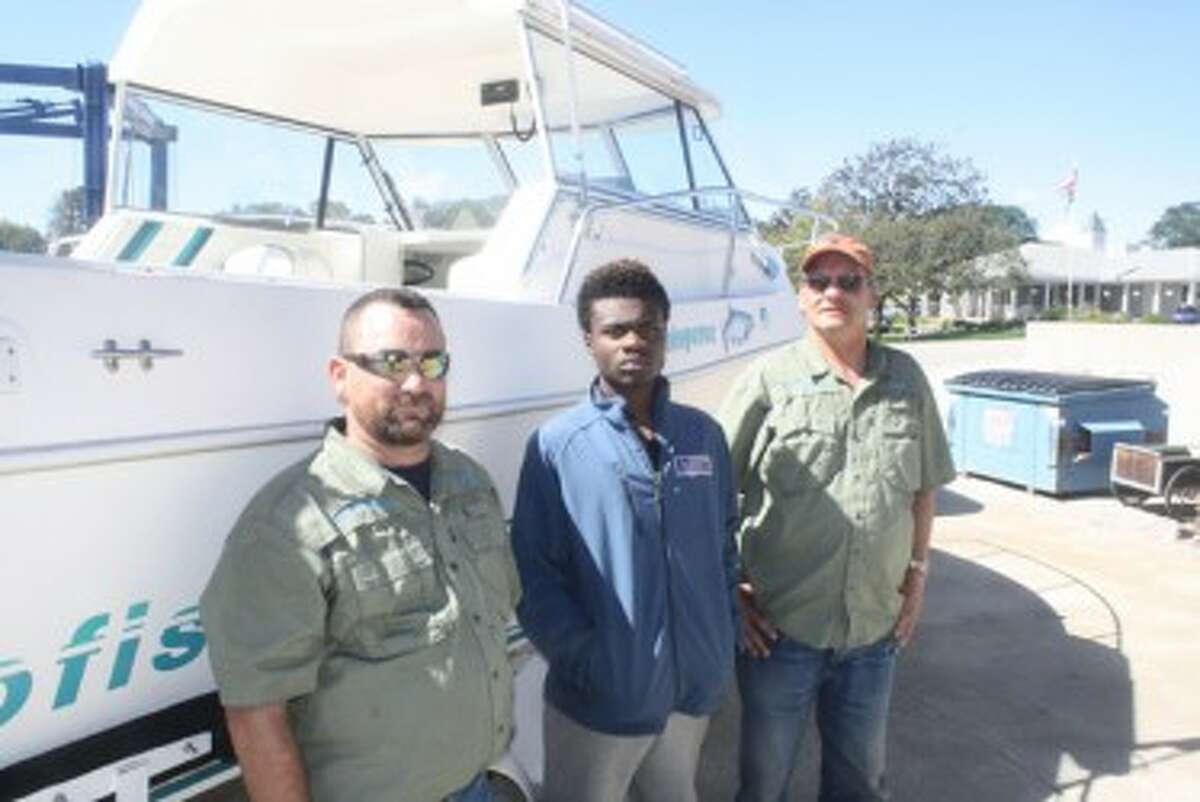 Pictured (from left to right): Larry Luckett, Andy Moten and Dave Acker of Midland’s Fish Whisperer. (John Raffel/Pioneer News Network)