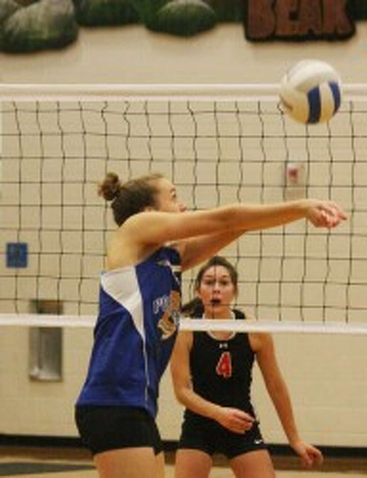 Onekama’s Kaylan Fitch gets a dig on Wednesday. (Dylan Savela/News Advocate)