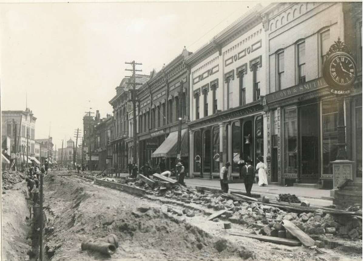 This 1900 photograph shows the River Street area being worked on in front of the current location of the Manistee County Historical Museum.