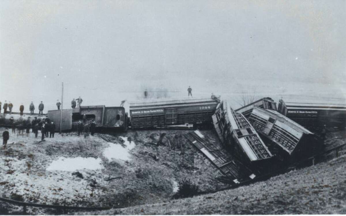 This photograph is of a train wreck that occurred in Manistee County.