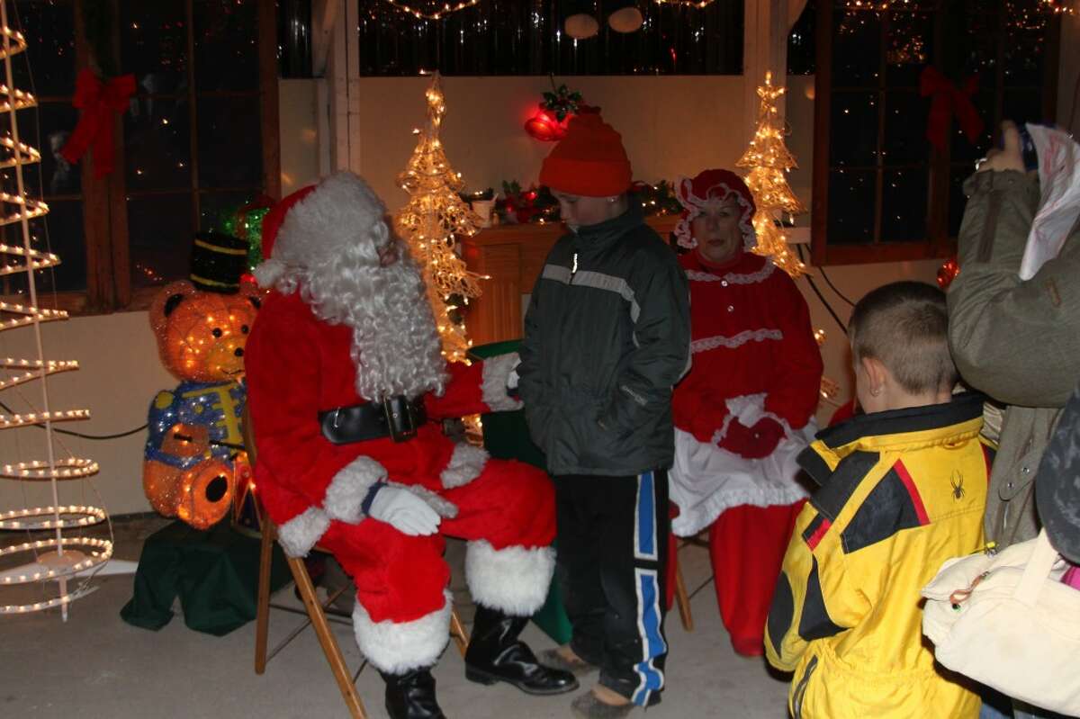 Santa Claus was a crowd favorite with all the children at the Bear Lake Sparkle in the Park celebration that opened on Saturday evening.