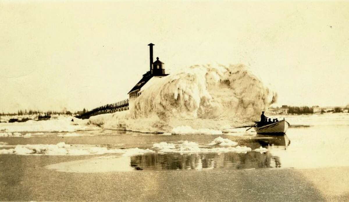 The Lighthouse at the beach was loaded with ice in this 1890s photograph.